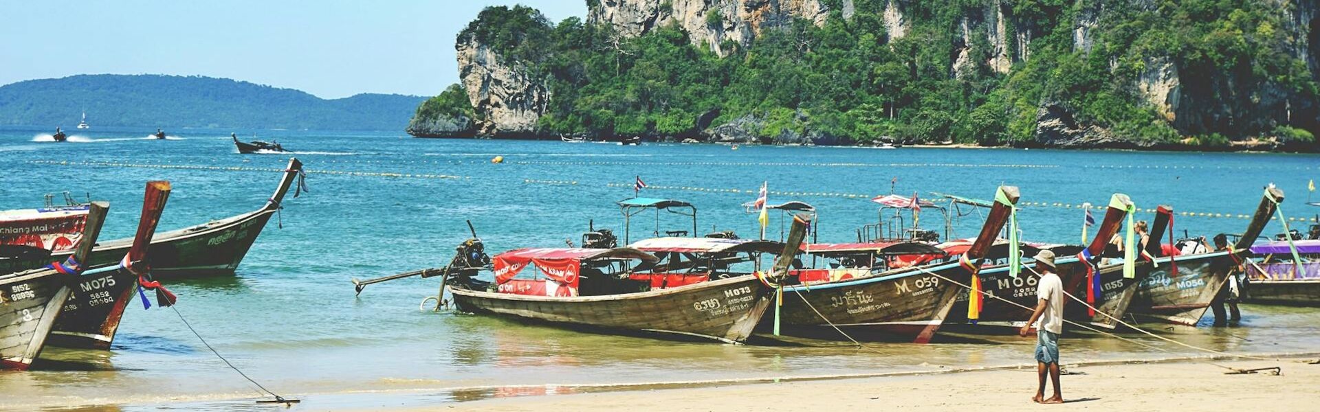 Kayaking in Ao Nang’s scenic waters on a thrilling Ao Nang Travel tour by Legend Travel Group.
